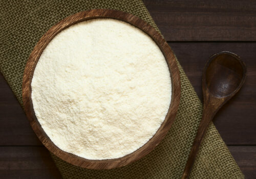 Powdered,Or,Dried,Milk,In,Wooden,Bowl,,Photographed,Overhead,With